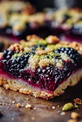 Homemade Blackberry Pistachio Dream Bars with fresh blackberries and pistachios