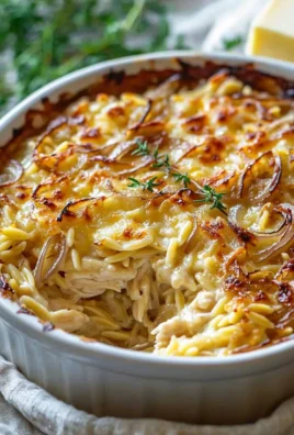 Delicious French onion chicken orzo casserole topped with melted cheese