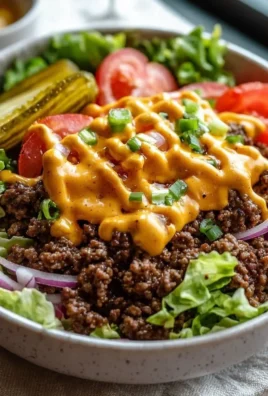 High-protein cheeseburger bowls ready for meal prep, low-carb and nutritious.