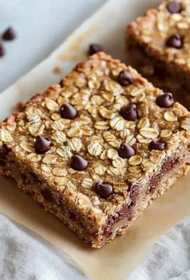 Delicious homemade oatmeal chocolate chip bars with gooey chocolate and oats
