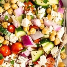 Colorful Mediterranean Chickpea Salad with fresh vegetables and herbs
