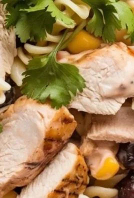 Delicious BBQ Chicken Pasta Salad with vibrant vegetables and barbecue sauce.