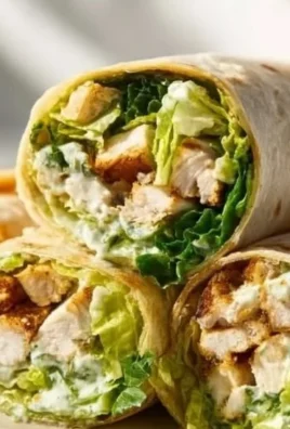 Chicken Caesar Wrap with romaine, grilled chicken, and Caesar dressing in a tortilla