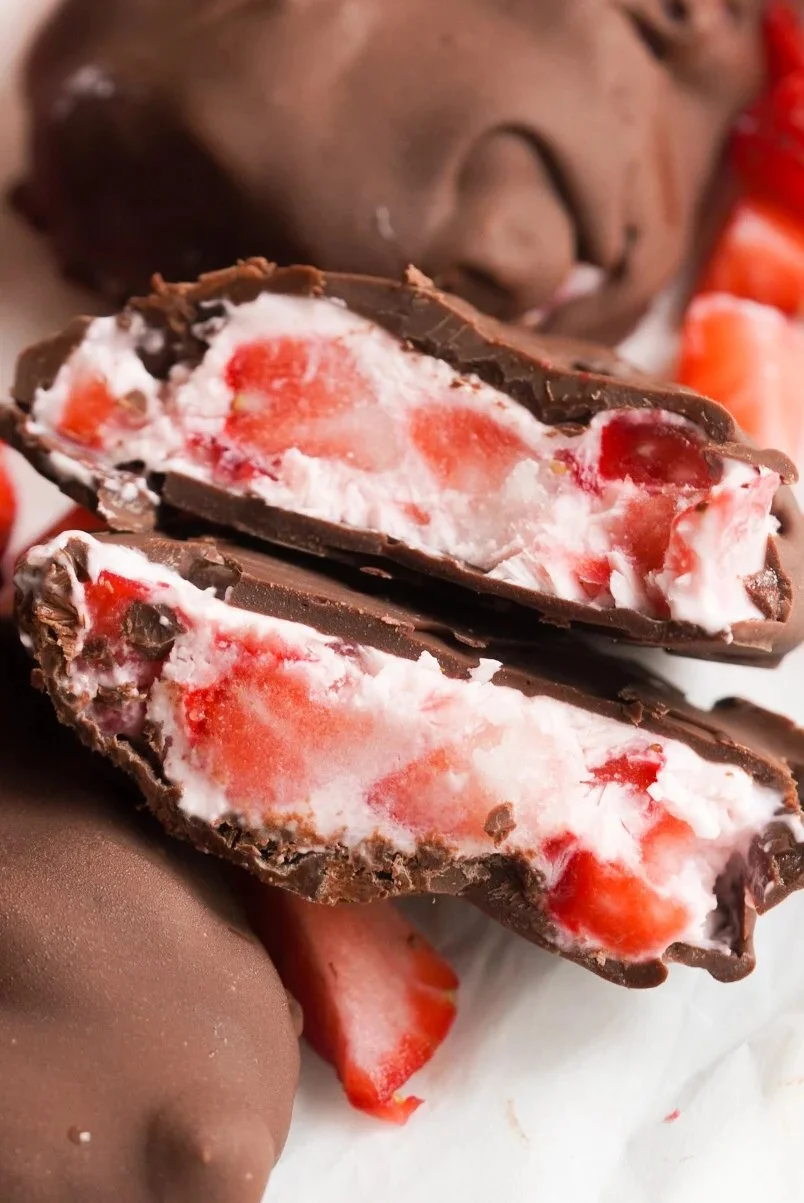 Delicious Chocolate Strawberry Yogurt Clusters topped with fresh strawberries.