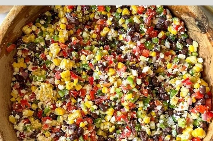 Colorful Corn Black Bean Salad with fresh veggies and a zesty dressing