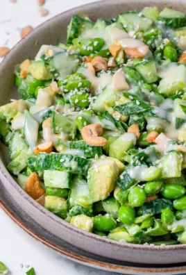 Cucumber Edamame Salad with creamy miso dressing served in a bowl