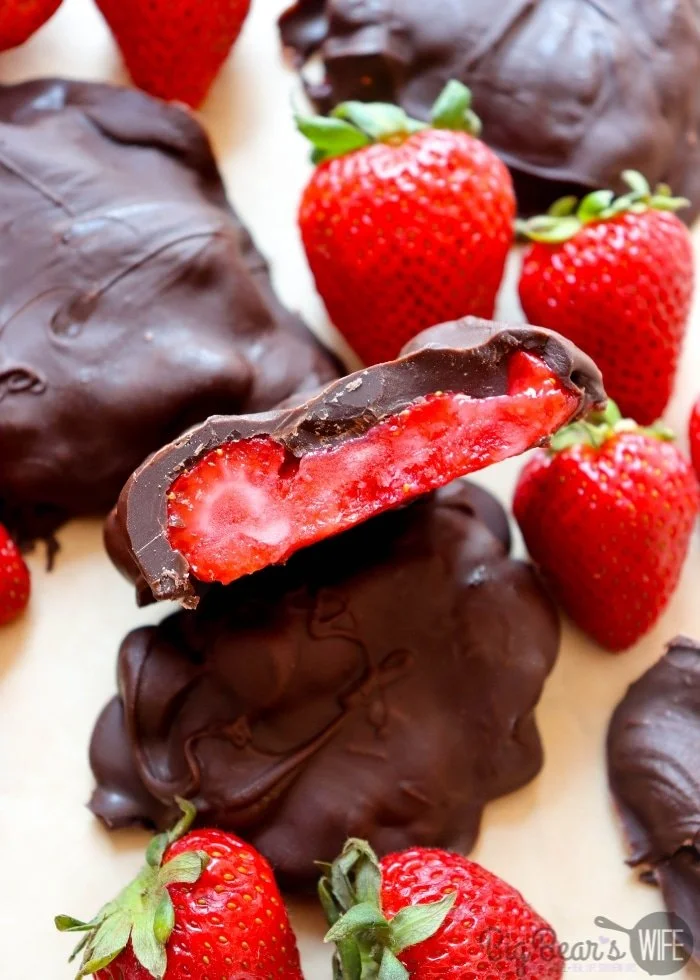 Frozen chocolate covered strawberry bites, a delicious cool treat.