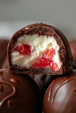 Frozen chocolate strawberry yogurt bites served in a bowl
