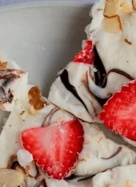 Greek yogurt bark topped with fresh fruits and nuts