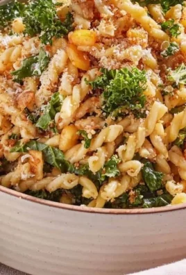 Hearty high-protein lemony kale pasta salad with fresh ingredients