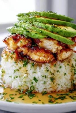 Delicious honey lime chicken avocado rice stack topped with fresh ingredients