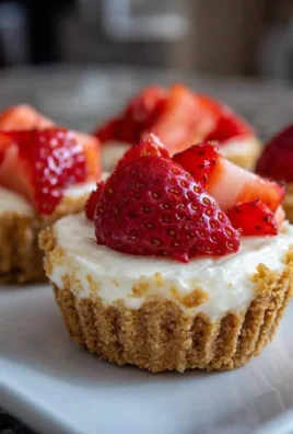 No-Bake Mini Cheesecake Cups served in elegant glass dessert cups