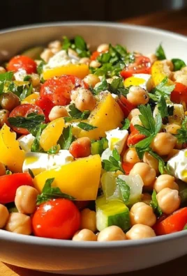 Mediterranean chickpea salad with lemon vinaigrette in a bowl