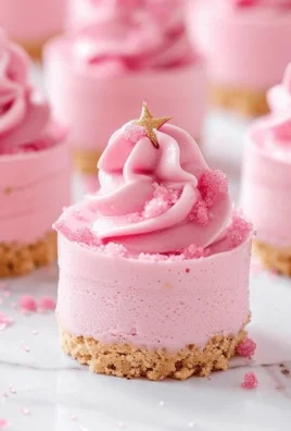 No-Bake Pink Velvet Cheesecake Bites served on a white plate