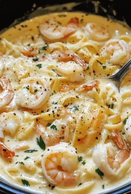 Delicious One Pot Shrimp and Crab Alfredo served with fresh parsley.