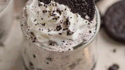 Oreo no-bake cheesecake cups served in elegant dessert cups
