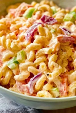 Delicious Pink Cadillac Pasta Salad - creamy and tangy, ideal for picnics