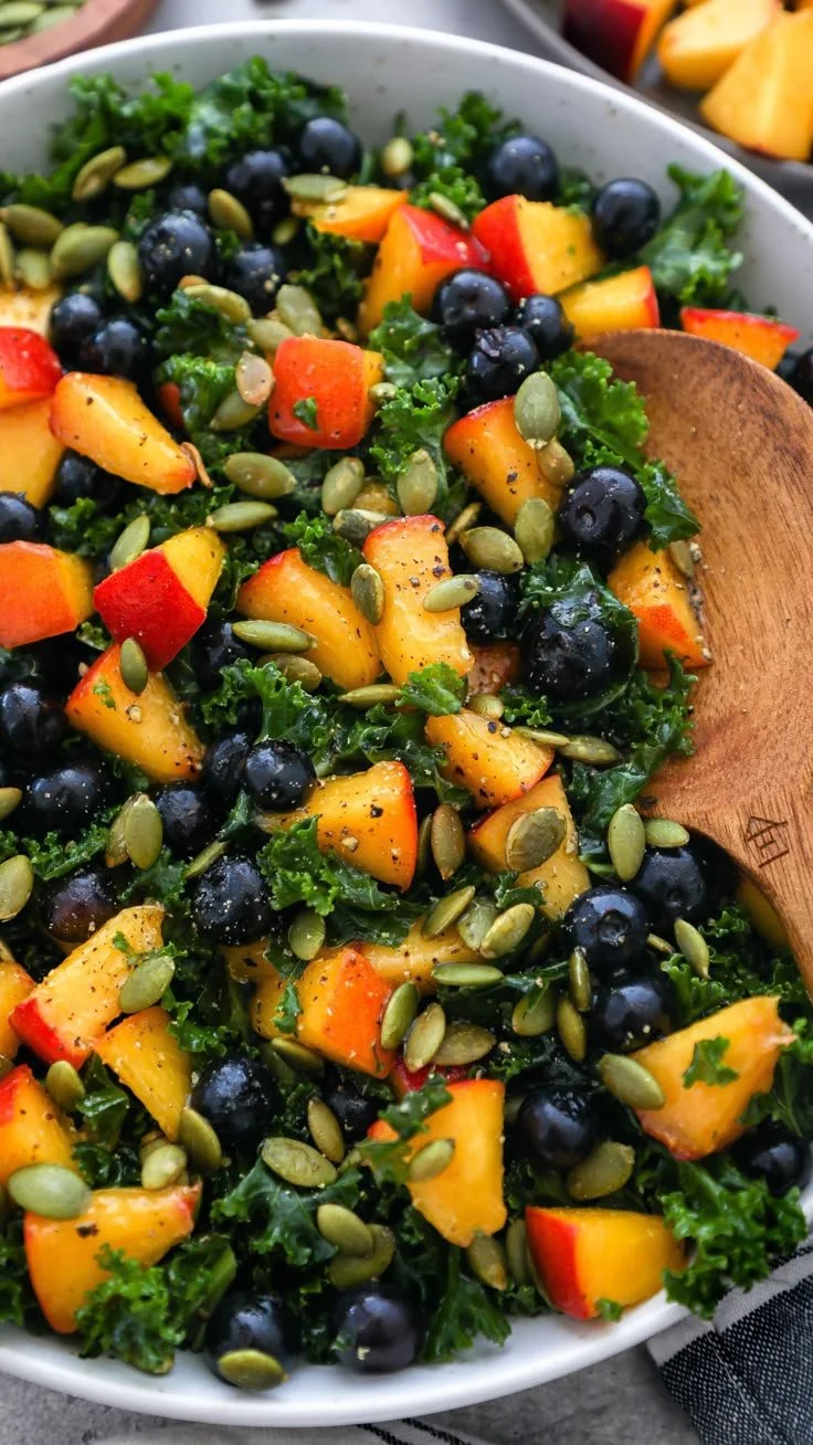 Delicious Summer Kale Salad with vibrant vegetables and dressing