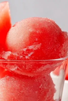 Delicious watermelon vodka sorbet served in a bowl, perfect summer dessert