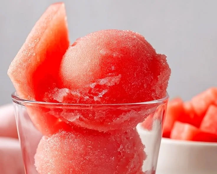 Delicious watermelon vodka sorbet served in a bowl, perfect summer dessert