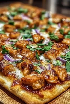 Delicious BBQ Chicken Flatbread Pizza topped with cheese and fresh ingredients