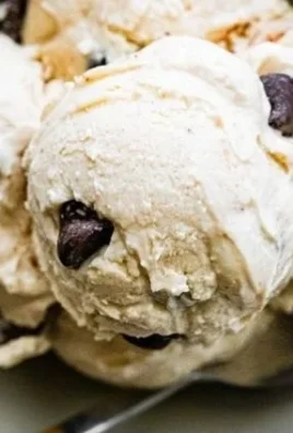 Bowl of creamy cottage cheese ice cream topped with fresh fruit