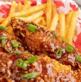 Delicious hot honey BBQ sauce drizzled over grilled chicken