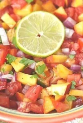 Bowl of Easy Peach Pico de Gallo with fresh ingredients