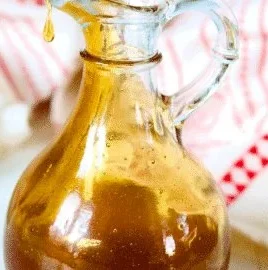 Homemade hot honey jar with chili peppers for a spicy twist