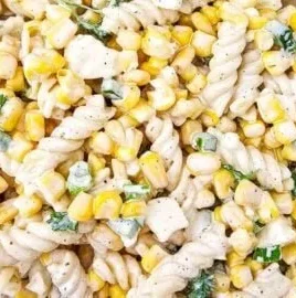 Colorful Mexican street corn pasta salad with fresh ingredients and spices