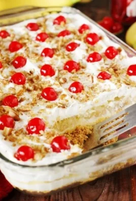 No-Bake Banana Split Cake with layers of cream and fresh bananas