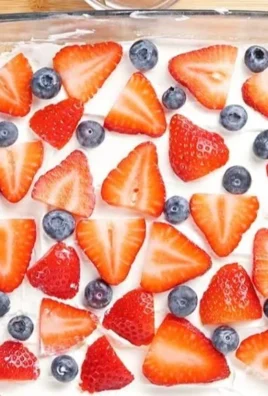 No Bake Summer Berry Dessert with fresh berries and cream
