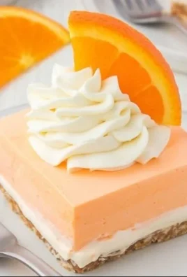 Delicious Orange Creamsicle Dream Bars served on a plate