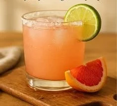 Delicious Paloma cocktail with tequila and grapefruit served in a glass.
