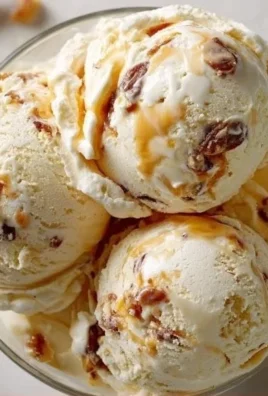 Salted caramel cottage cheese ice cream served in a bowl with a spoon.