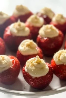 Delicious strawberry cheesecake bites served on a white platter