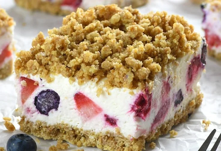 Delicious summer berry dessert featuring fresh strawberries, blueberries, and raspberries.