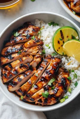 Tangy marinated Asian grilled chicken on the grill