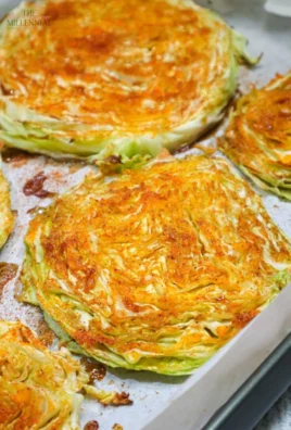 Delicious grilled cabbage steaks served with spices and herbs