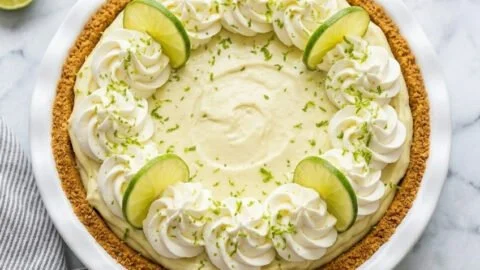 Delicious no-bake key lime pie with a graham cracker crust and lime garnish