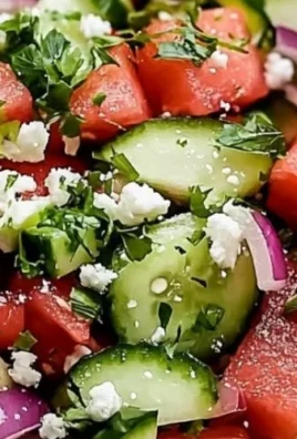 Fresh and colorful watermelon salad with mint and feta cheese.