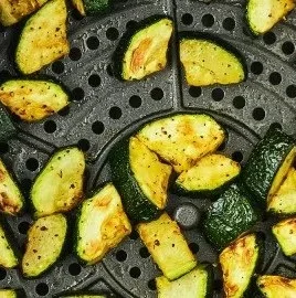 Crispy air fryer zucchini slices served as a healthy side dish