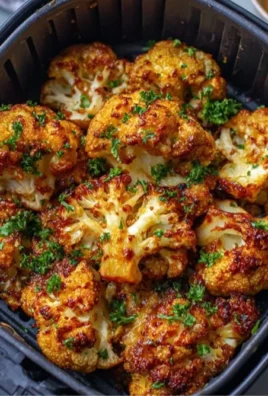 Crispy Bang Bang Cauliflower Wings served with spicy sauce