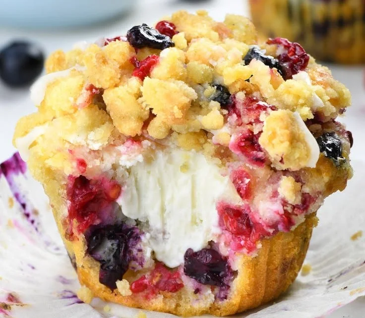 Delicious Berry Cream Cheese Muffins with fresh berries and creamy filling