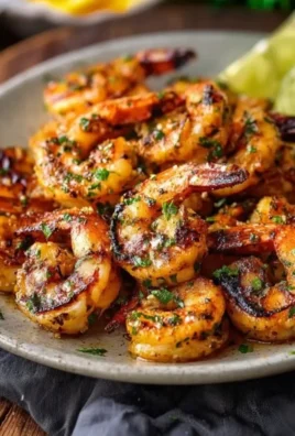 Delicious marinated grilled shrimp on a barbecue grill