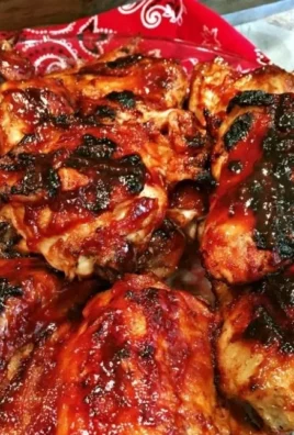 Delicious Cherry Dr Pepper BBQ Chicken on a grill, ready to serve.