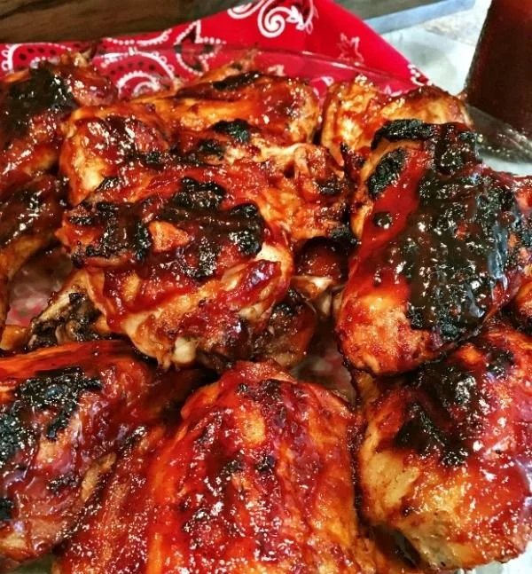 Delicious Cherry Dr Pepper BBQ Chicken on a grill, ready to serve.