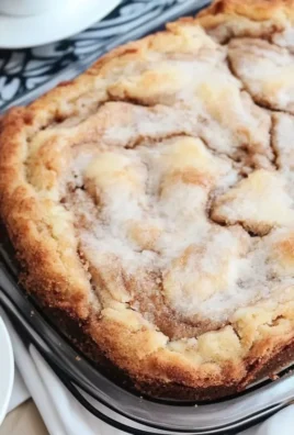 Delicious Cinnamon Swirl Coffee Cake with rich cinnamon topping