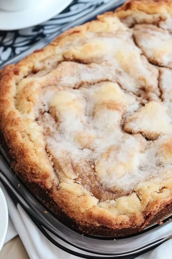 Delicious Cinnamon Swirl Coffee Cake with rich cinnamon topping