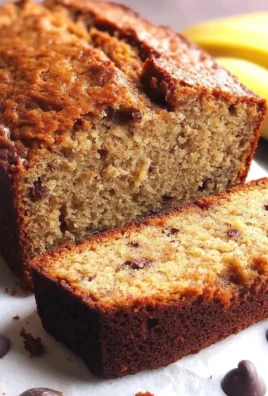 Freshly baked classic banana bread with ripe bananas and walnuts